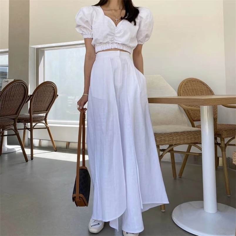 Summer 2 Piece Set Women V-Neck Puff Sleeve Sexy Short Tops + High Waist Split wide leg pants Fashion Suits 210519, White
Summer 2 Piece Set Women V-Neck Puff Sleeve Sexy Short Tops + High Waist Split wide leg pants Fashion Suits 210519, White