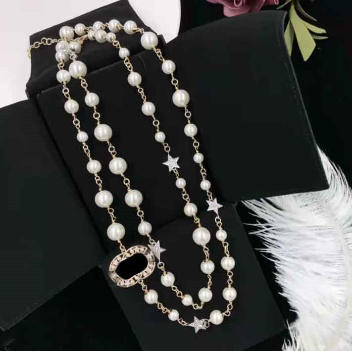 Designer luxury classic style Strands strings necklaces Party elegant pearl chain long double layer sweater statement necklace for woman ccs letter cha nels
Designer luxury classic style Strands strings necklaces Party elegant pearl chain long double layer sweater statement necklace for woman ccs letter cha nels