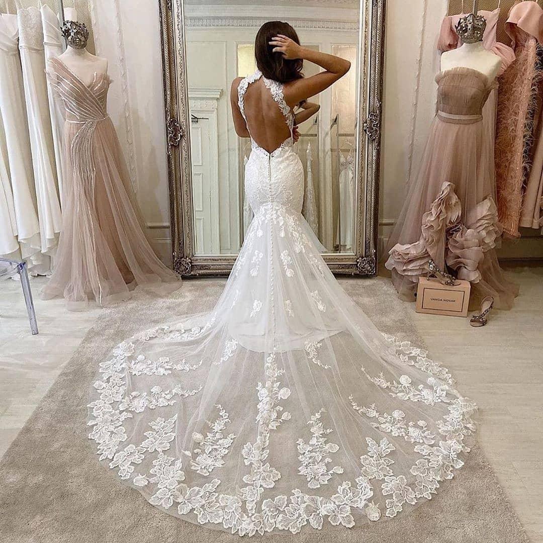 Stunning Elegant Mermaid Wedding Dress High Neck Halter Sleeveless Lace Appliques Illusion Backless Bridal Gowns Court Train