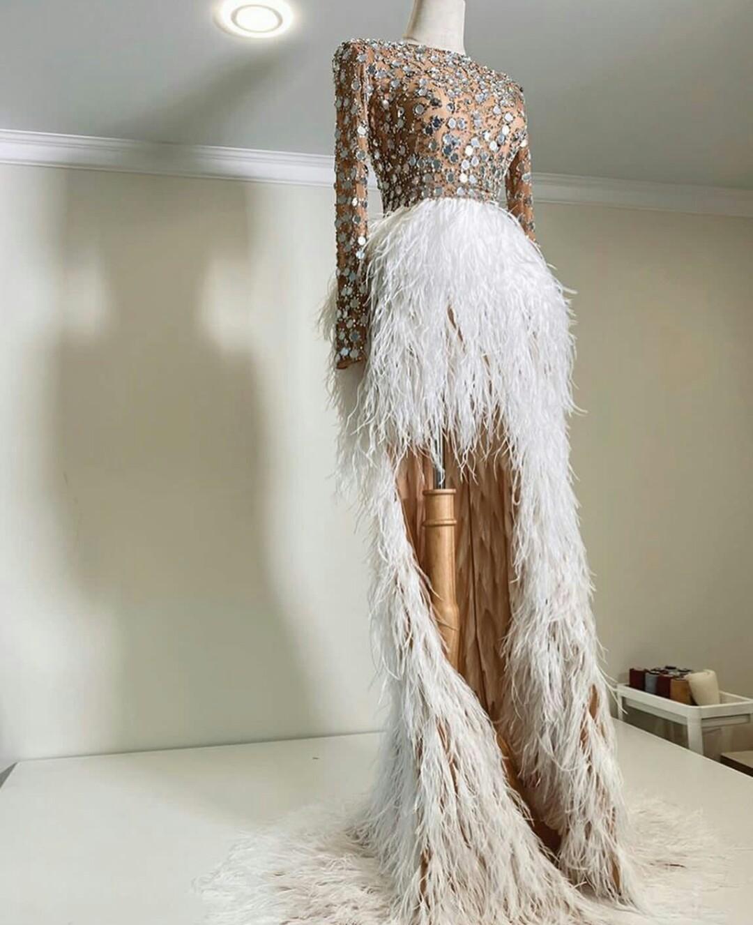 Sexy Illusion Top Evening Dresses with Sequins crystal african Hi Lo Feather Skirt Arabic Aso Ebi Prom Gowns with Long Sleeves