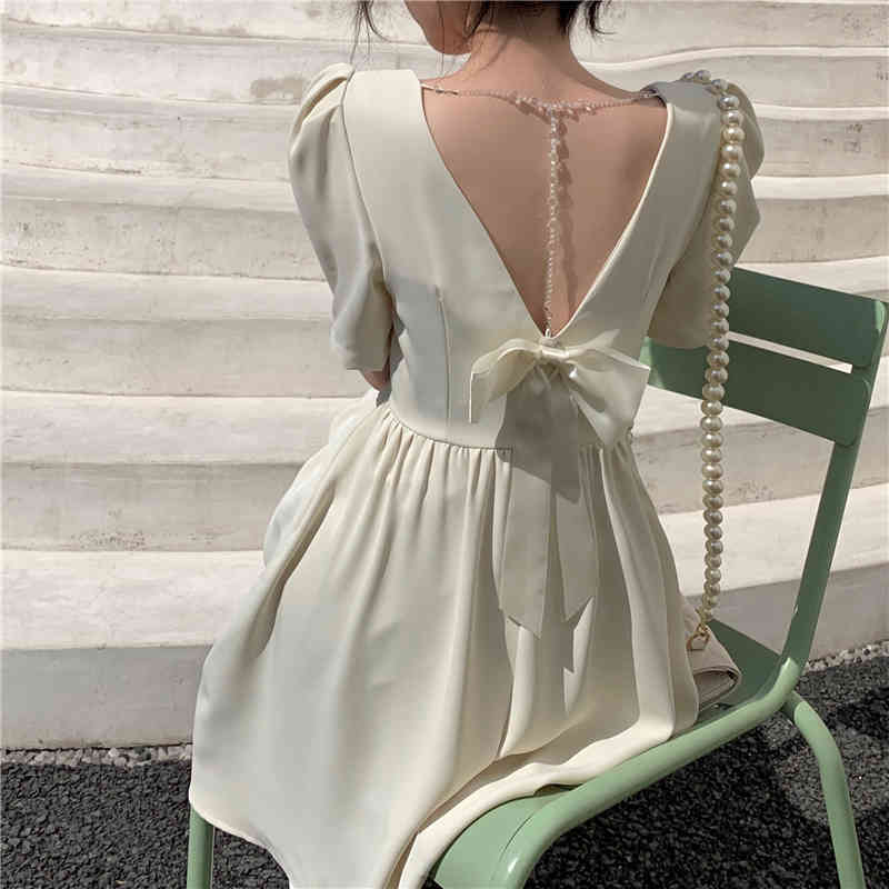 Sexy Sweet Backless Bow Mini Dress Summer Korean Casual Vintage Girl Puff Sleeve Slim Solid Party Dress 210518