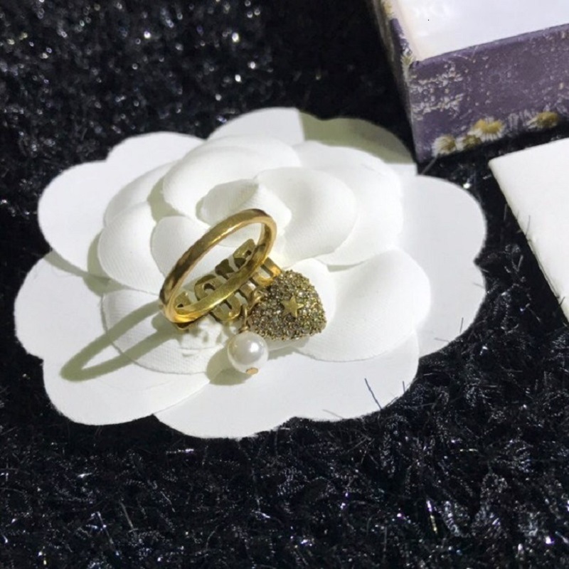 Dijia / Dejia ring new letter Pearl Heart Ring brass material D7JK