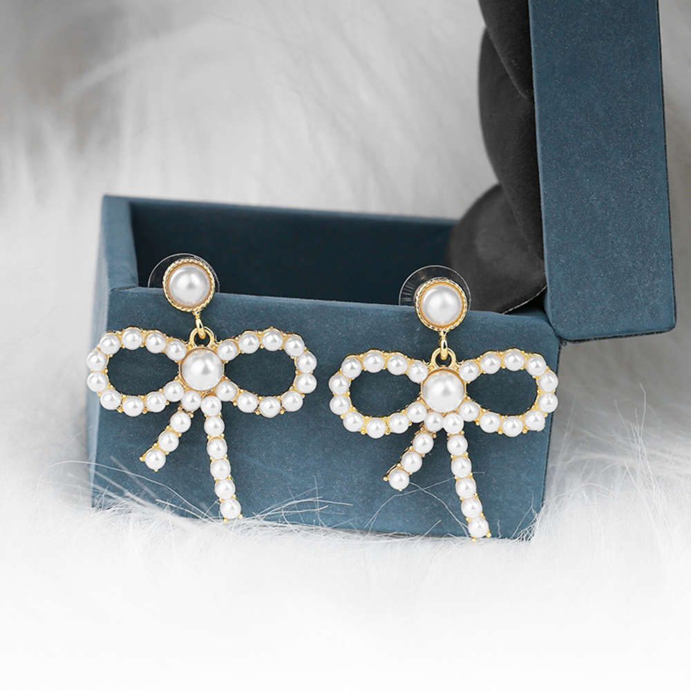 earrings French fashion temperament 925 bowknot Pearl Earrings simple cool style personality live broadcast, Golden
earrings French fashion temperament 925 bowknot Pearl Earrings simple cool style personality live broadcast, Golden