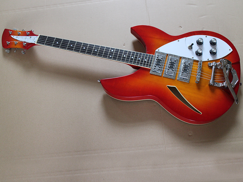 Limited edition John Lennon 325 Semi hollow electric guitar, 3 pick-up heavy trill jazz electric guitar, double white pick protection
Limited edition John Lennon 325 Semi hollow electric guitar, 3 pick-up heavy trill jazz electric guitar, double white pick protection