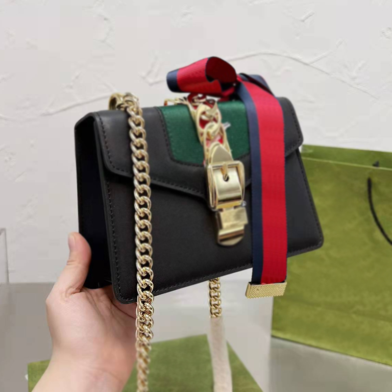 Designer Women Sylvie Navy Shoulder Bag Italy Brand Cowhide Genuine Leather Crossbody Handbag Lady Mini Colored Ribbon Chain Flap Handbags Luxurys Designers Bags, Red 
Designer Women Sylvie Navy Shoulder Bag Italy Brand Cowhide Genuine Leather Crossbody Handbag Lady Mini Colored Ribbon Chain Flap Handbags Luxurys Designers Bags, Red