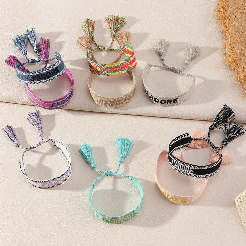 Tennis Nepal Ethnic Luxury Fabric Bracelet J ADORE Embroidery Letter Hand-woven Tassels Wrap Bracelets For Women Men Friendship Gift
Tennis Nepal Ethnic Luxury Fabric Bracelet J ADORE Embroidery Letter Hand-woven Tassels Wrap Bracelets For Women Men Friendship Gift