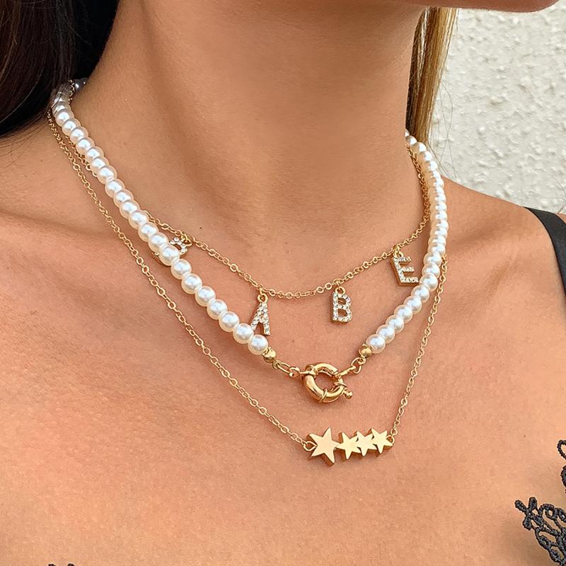 Pendant Necklaces Rudder Pearl For Women Retro Babe Letters Chain Gold Color Star Necklace Creativity Body Jewelry Ins Bijouterie
Pendant Necklaces Rudder Pearl For Women Retro Babe Letters Chain Gold Color Star Necklace Creativity Body Jewelry Ins Bijouterie