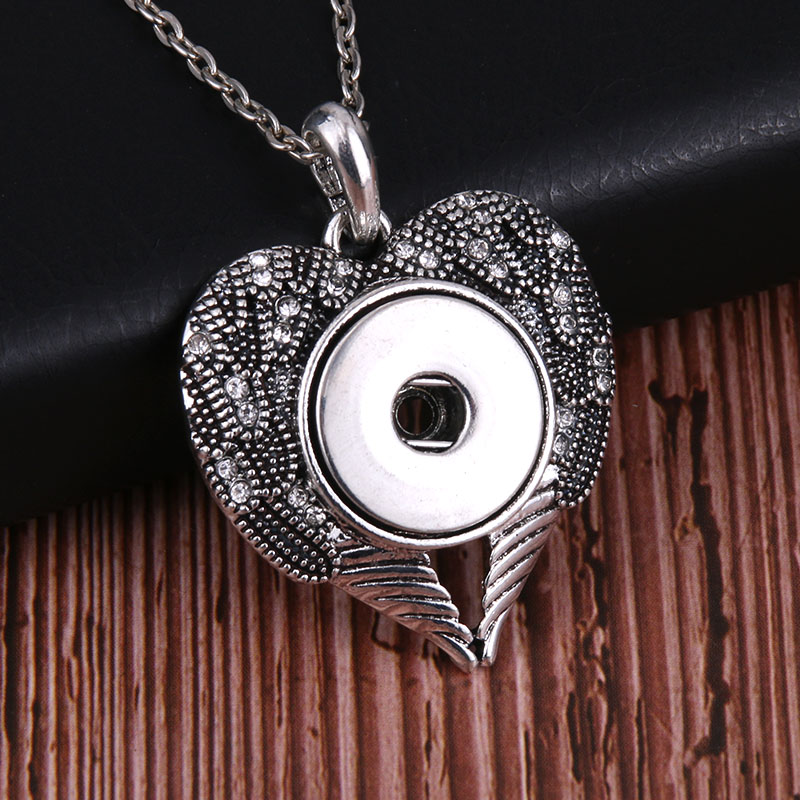 New snaps jewelry Heart shaped wing with crystal rhinestone snap necklace 18mm Pendant necklace women girl fun Christmas gift
New snaps jewelry Heart shaped wing with crystal rhinestone snap necklace 18mm Pendant necklace women girl fun Christmas gift