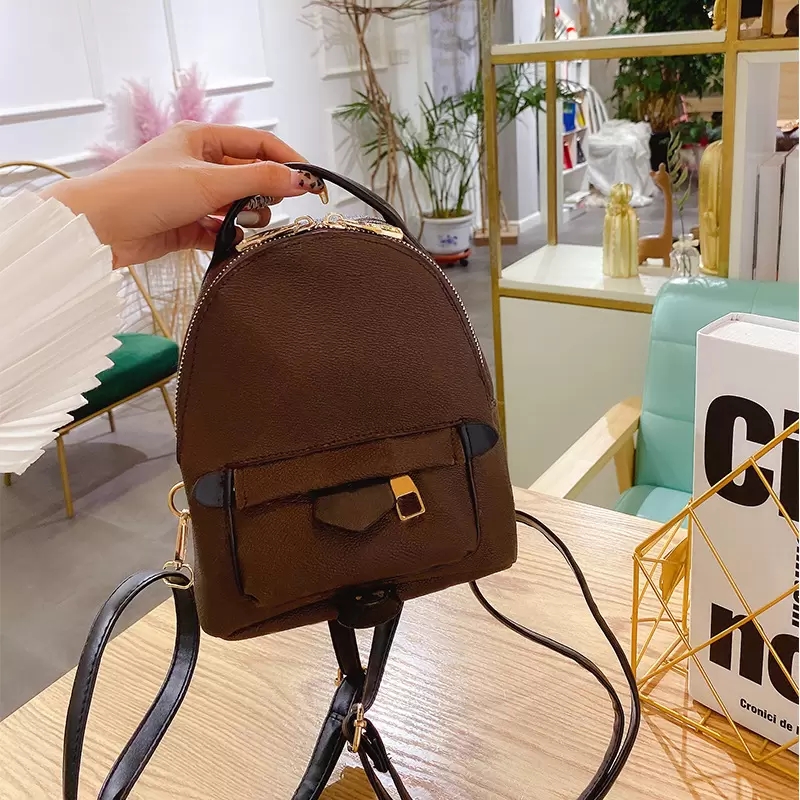 WF Luxurys Designers women Mini Backpack Bags Cross body School Travel bag MM luxury Handbags lady PU Genuine Leather fashion shoulder Purse 41562
WF Luxurys Designers women Mini Backpack Bags Cross body School Travel bag MM luxury Handbags lady PU Genuine Leather fashion shoulder Purse 41562