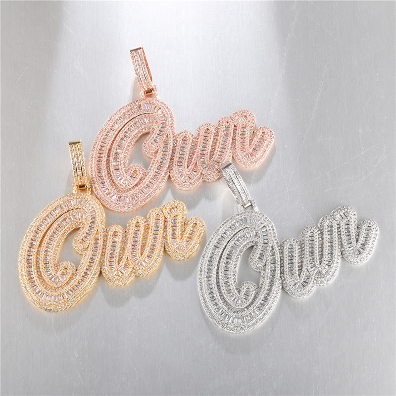 New Fashion DIY Custom Name Letter Pendant Necklace Gold Silver Color Bling Iced Out CZ Stone Cursive Letters Pendant Necklace with 3mm 24inch Rope Chain for Men Women
New Fashion DIY Custom Name Letter Pendant Necklace Gold Silver Color Bling Iced Out CZ Stone Cursive Letters Pendant Necklace with 3mm 24inch Rope Chain for Men Women