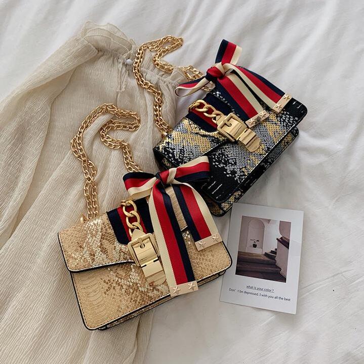 Factory wholesale women handbag sweet lovely bow womens messenger bags gold metal lock chain bag contrast serpentine leather handbags
Factory wholesale women handbag sweet lovely bow womens messenger bags gold metal lock chain bag contrast serpentine leather handbags
