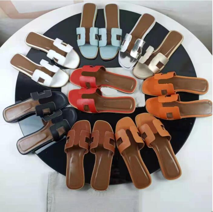 2021 Designer Woman shoes High Quality slipper Leather Flat Sandals Fashion Slides Slide Rubber Ladies Beach Women Slippers shoe with box
2021 Designer Woman shoes High Quality slipper Leather Flat Sandals Fashion Slides Slide Rubber Ladies Beach Women Slippers shoe with box