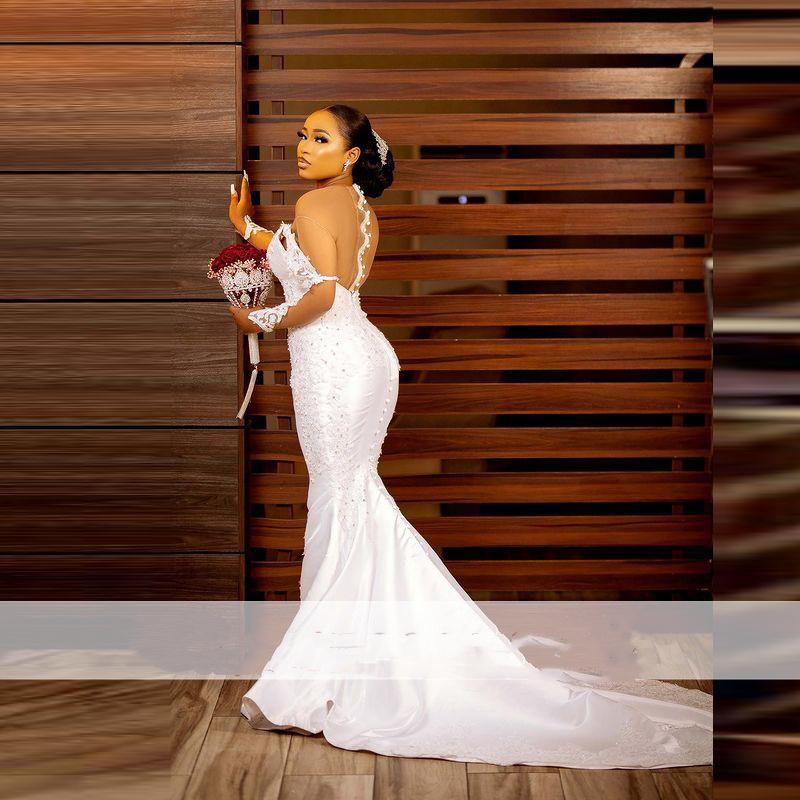 Aso Ebi Mermaid Wedding Dresses With Sheer Neck Illusion Long Sleeves Bridal Dress Lace Appliques Pearls vestido de noiva Sexy Backless African Bridal