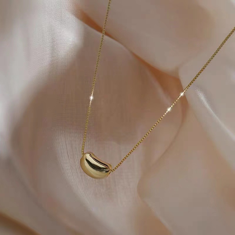 Pendant Necklaces New Titanium Steel Jequirity Bean Simple All-Match Clavicle Chain Light Luxury Minority Design Sense Little Golden Beans Factory Direct Supp
Pendant Necklaces New Titanium Steel Jequirity Bean Simple All-Match Clavicle Chain Light Luxury Minority Design Sense Little Golden Beans Factory Direct Supp