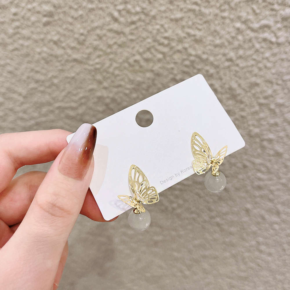 Butterfly hollowed out cat's eye stone earrings small simple temperament fashion net red Earrings women's trend, Silver
Butterfly hollowed out cat's eye stone earrings small simple temperament fashion net red Earrings women's trend, Silver