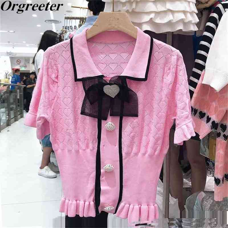Knitted Pearl Button Pullover Tops Summer Lapel Hollow out Breathable Diamond Bowknot Ruched Hem Thin Sweater 210602, White
Knitted Pearl Button Pullover Tops Summer Lapel Hollow out Breathable Diamond Bowknot Ruched Hem Thin Sweater 210602, White