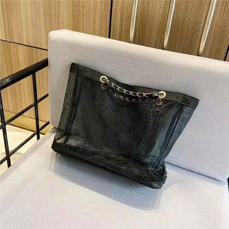Beach Makeup Bag Black handbag handbag net famous cosmetics store beauty Handbag Black shopping net bag
Beach Makeup Bag Black handbag handbag net famous cosmetics store beauty Handbag Black shopping net bag