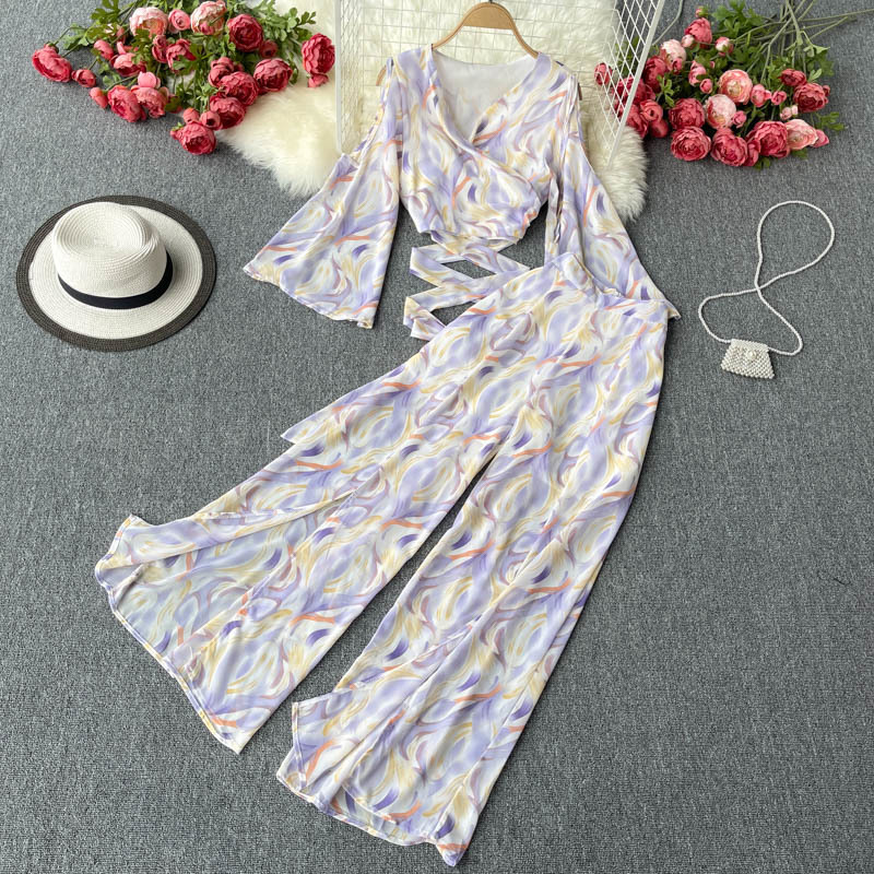 Vacation suit women's short top with tie-in waist and thin split wide leg pants chiffon two-piece 210525, Blue
Vacation suit women's short top with tie-in waist and thin split wide leg pants chiffon two-piece 210525, Blue