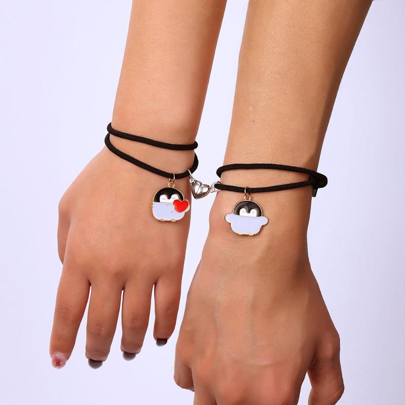 Charm Bracelets Cute Cartoon Penguin Love Heart Magnetic Adjustable Couple Bracelet For Christmas Men Womens Friendship Jewelry Gift, Golden;silver 
Charm Bracelets Cute Cartoon Penguin Love Heart Magnetic Adjustable Couple Bracelet For Christmas Men Womens Friendship Jewelry Gift, Golden;silver