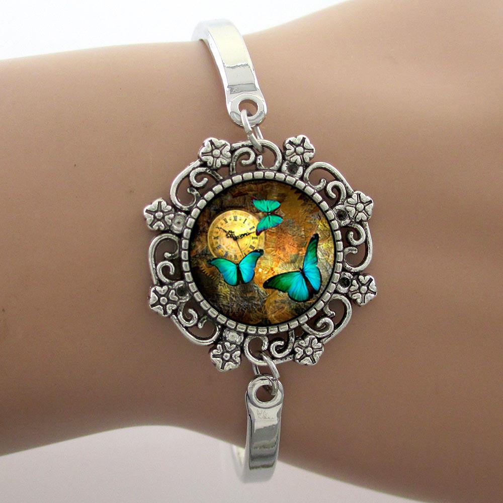Beautiful Butterfly Charm Glass Dome Bracelets Silver Lovely Jewelry High Quality Polish Metal Bangles 1 pc Free Shipping
Beautiful Butterfly Charm Glass Dome Bracelets Silver Lovely Jewelry High Quality Polish Metal Bangles 1 pc Free Shipping