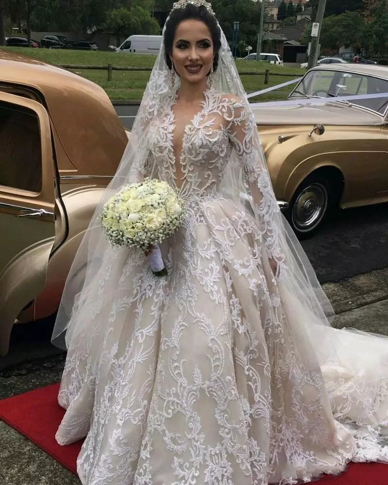 Illusion Long Sleeves Plunging Neckline Ball Gown Luxury Wedding Dresses Applique Lace Wedding Dress Sweep Train Bridal Gowns Custom Made