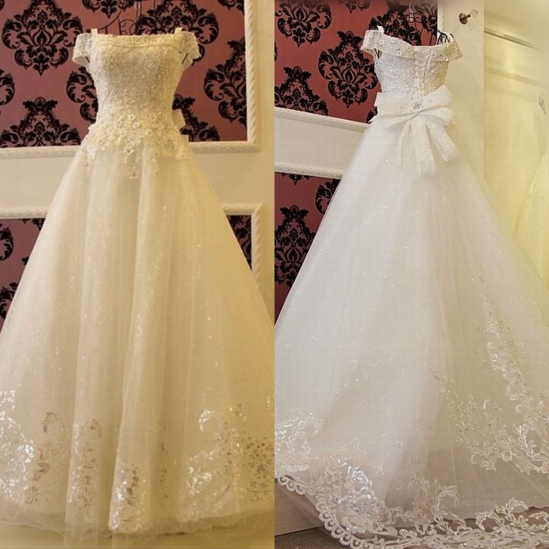Sparkly Wedding Gowns Off the Shoulder Beaded 3d Floral Appliques Sequined Appliques Tulle Corset Wedding Dresses Bridal Gown with Bow, Custom made from color chart
Sparkly Wedding Gowns Off the Shoulder Beaded 3d Floral Appliques Sequined Appliques Tulle Corset Wedding Dresses Bridal Gown with Bow, Custom made from color chart
