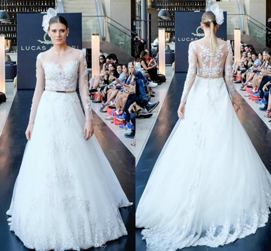 Sheer Neck Wedding Dress Applqiue Lace Long Sleeve A Line Peplum Made in China Elegant White Bridal Gowns 2016 vestido de Novia
Sheer Neck Wedding Dress Applqiue Lace Long Sleeve A Line Peplum Made in China Elegant White Bridal Gowns 2016 vestido de Novia