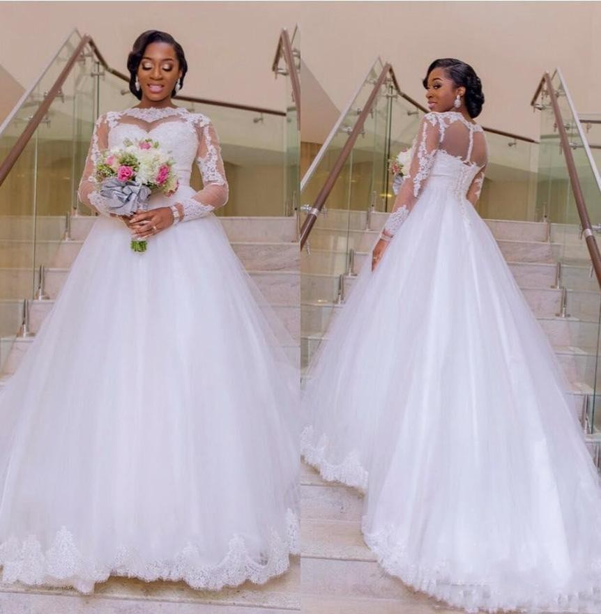 2017 Wedding Dresses African Jewel Neck Illusion Sheer Long Sleeves Lace Applique Beads Tulle Sweep Train Plus Size Formal Bridal Gowns, Ivory
2017 Wedding Dresses African Jewel Neck Illusion Sheer Long Sleeves Lace Applique Beads Tulle Sweep Train Plus Size Formal Bridal Gowns, Ivory