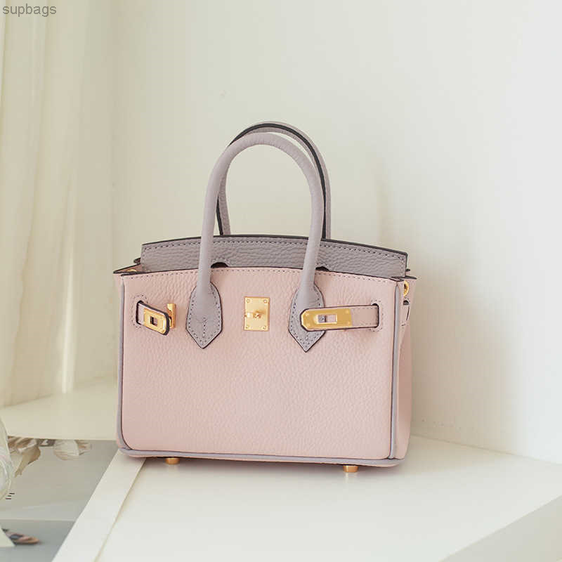 Birkins tote handbag First layer cow leather mini small 2021 new leather women's single shoulder portable messenger color matching B-001, Powdered taro purple 20cm
Birkins tote handbag First layer cow leather mini small 2021 new leather women's single shoulder portable messenger color matching B-001, Powdered taro purple 20cm