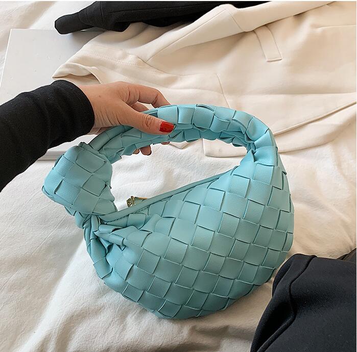 Factory wholesale women bag summer candy colors fashion shoulder handbag simple versatile solid color leather handbags street personality woven shell bag
Factory wholesale women bag summer candy colors fashion shoulder handbag simple versatile solid color leather handbags street personality woven shell bag