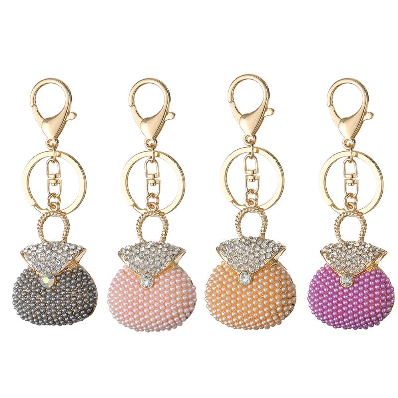 Keychains 1 PC Rhinestone Pearl Handbag Shaped Car Keychain Metal Pendant Fashion Chain Ornaments Auto Interior Accessories
Keychains 1 PC Rhinestone Pearl Handbag Shaped Car Keychain Metal Pendant Fashion Chain Ornaments Auto Interior Accessories