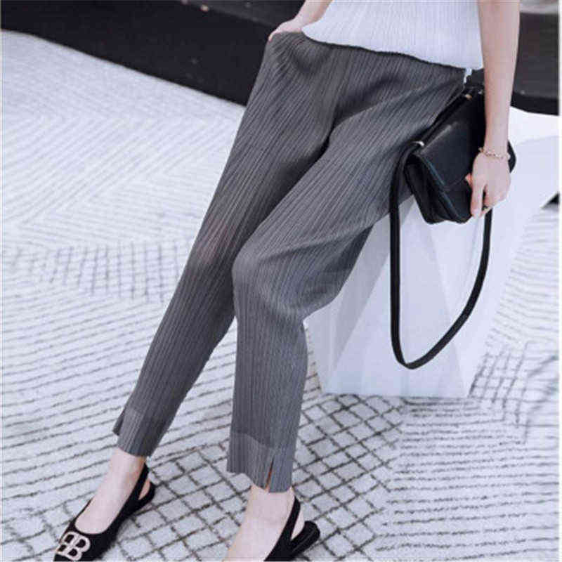 Miyake folds fashion cropped trousers, solid color, large size, slim fit, urban casual pants, split women's pants 211115