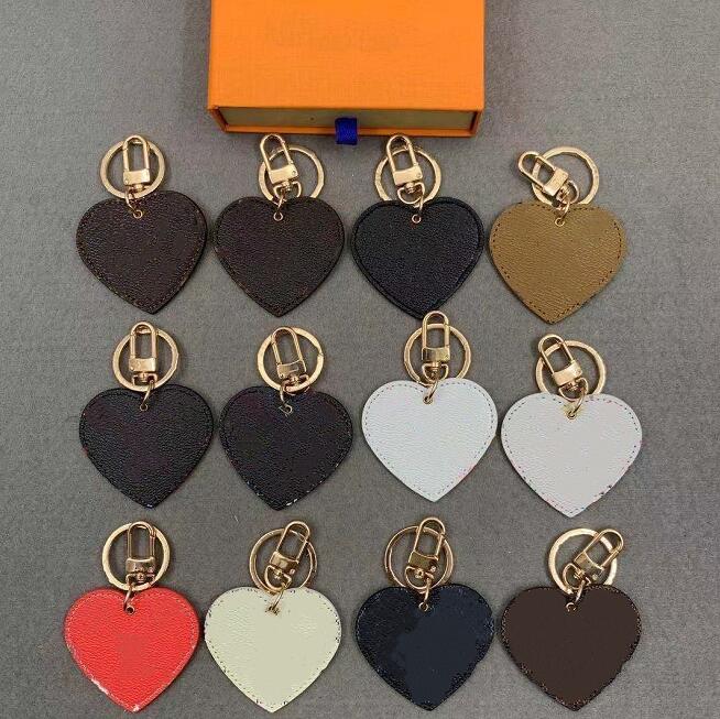 12 Style Heart Key chain Buckle Letter Pattern Car Keychain Handmade Leather Designers Keychains Men Women Bag Pendant No Box
12 Style Heart Key chain Buckle Letter Pattern Car Keychain Handmade Leather Designers Keychains Men Women Bag Pendant No Box