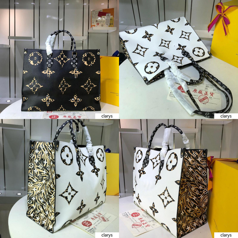 Luvitto Luis vititon ontego white jungle animal giant Handle Tote Shoulder Bag ungle black collection m44571 size: 41.0 × 34.0 19.0cm
Luvitto Luis vititon ontego white jungle animal giant Handle Tote Shoulder Bag ungle black collection m44571 size: 41.0 × 34.0 19.0cm