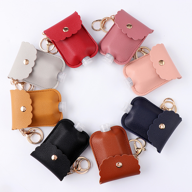 Portable PU leather Plastic Travel Bottle 30ml Hand sanitizer holder with Keychain WXY130
Portable PU leather Plastic Travel Bottle 30ml Hand sanitizer holder with Keychain WXY130