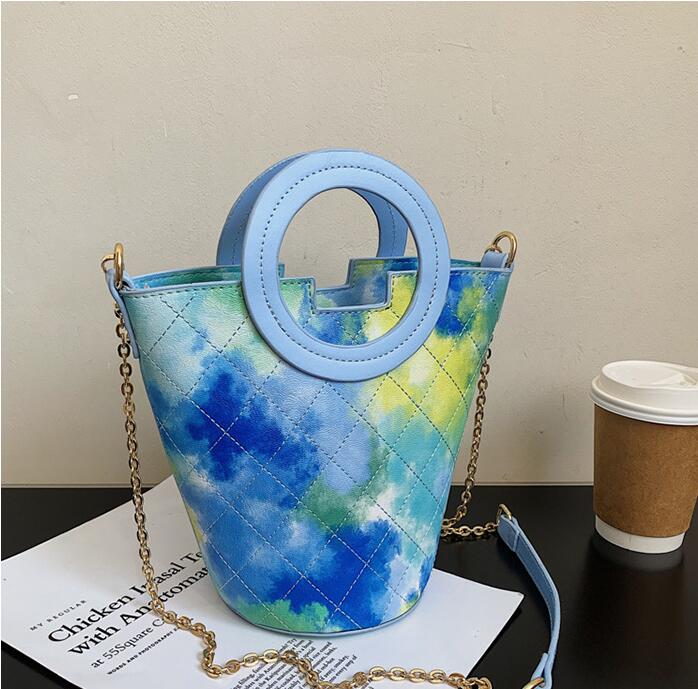 Factory wholesale women shoulder bags summer candy color fashion handbag personality colorful graffiti bucket bag sweet small pure and fresh leather handbags
Factory wholesale women shoulder bags summer candy color fashion handbag personality colorful graffiti bucket bag sweet small pure and fresh leather handbags