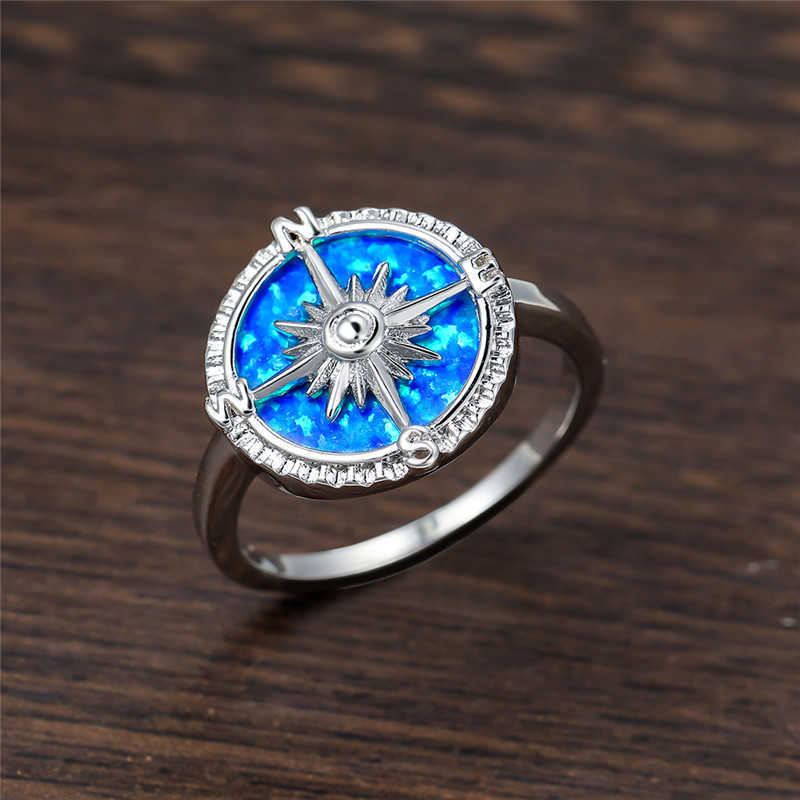 Blue Fire Opal Stone Ring Male Female Creative Compass Ring Classic Cross Silver Color Wedding Rings For Women Geometric Jewelry X0715, Slivery;golden
Blue Fire Opal Stone Ring Male Female Creative Compass Ring Classic Cross Silver Color Wedding Rings For Women Geometric Jewelry X0715, Slivery;golden
