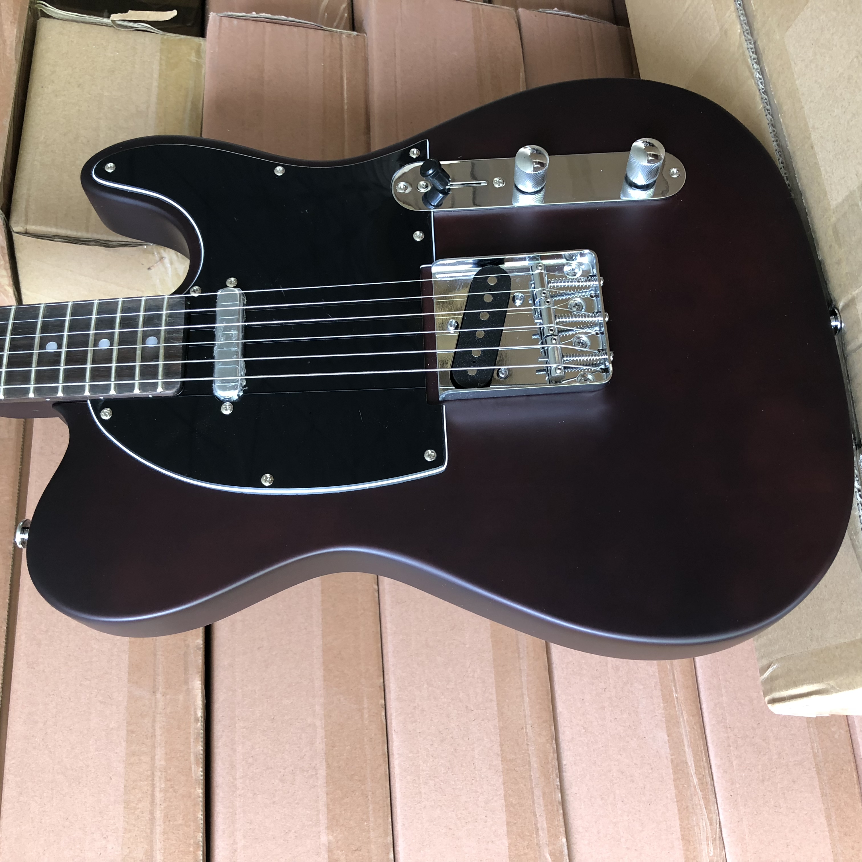Custom Shop George Harrison Matte Brown Tele Electric Guitar Rosewood Fingerboard, Vintage Tuners, 3 Saddle Bridge
Custom Shop George Harrison Matte Brown Tele Electric Guitar Rosewood Fingerboard, Vintage Tuners, 3 Saddle Bridge