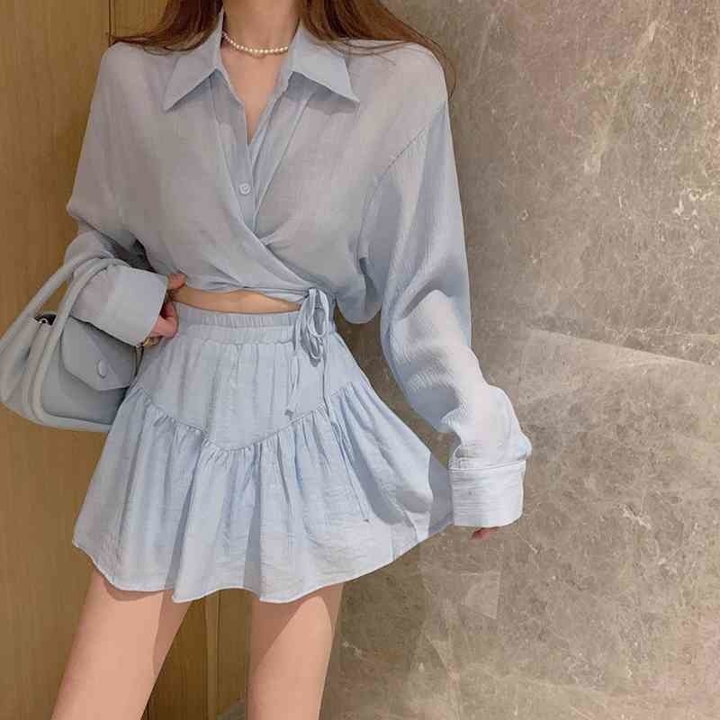 French niche summer temperament strappy lapel thin shirt + age-reducing high-waist pleated A-line skirt 210525
French niche summer temperament strappy lapel thin shirt + age-reducing high-waist pleated A-line skirt 210525