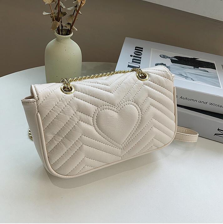 Wholesale factory ladies leathers shoulder bags with high quality styling sewing fashion backpack classic embossed leather chain bag clamshell striped handbag, White 1613
Wholesale factory ladies leathers shoulder bags with high quality styling sewing fashion backpack classic embossed leather chain bag clamshell striped handbag, White 1613