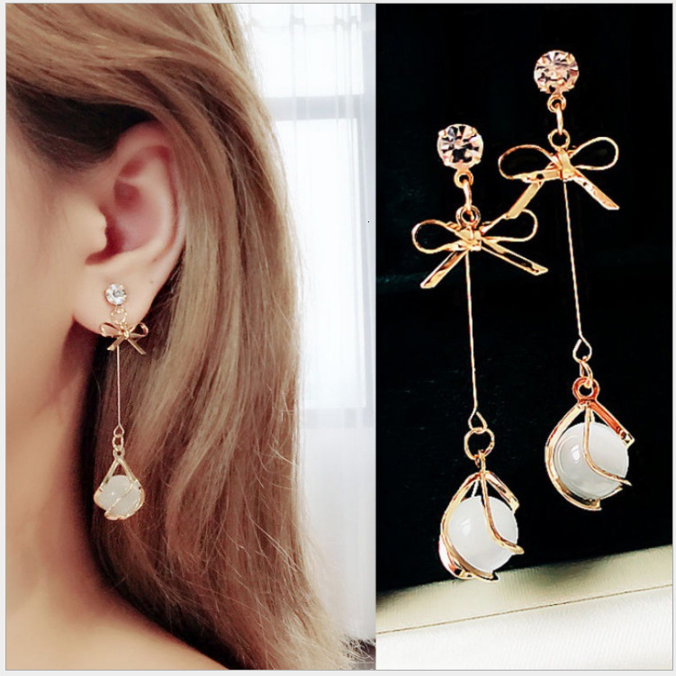 Earrings 925 silver needle cat's eye stone earrings show thin temperament bowknot academy style lady long, Golden
Earrings 925 silver needle cat's eye stone earrings show thin temperament bowknot academy style lady long, Golden
