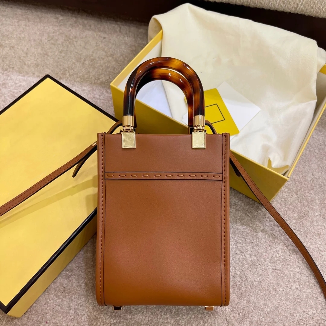 Mini Tote Womens Designer Bags Handbags Sunshine Luxurys Crossbody Shouler Bags Ladies Small Purses Cowhide 2022 Vintage Brown with Letters, Box(not sold separately)
Mini Tote Womens Designer Bags Handbags Sunshine Luxurys Crossbody Shouler Bags Ladies Small Purses Cowhide 2022 Vintage Brown with Letters, Box(not sold separately)
