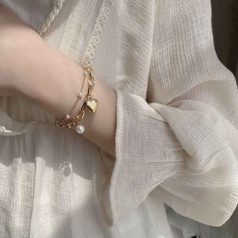 Hand catenary girl Heart temperament double pearl chain peach heart pendant student Bracelet, Golden;silver
Hand catenary girl Heart temperament double pearl chain peach heart pendant student Bracelet, Golden;silver