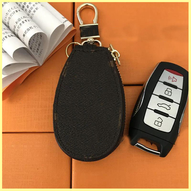 Luxurys Car key chain Coin Purse Letter Keychains Metal Buckle Unisex Designer Men Women Pendant key case Wallet Accessories 21112601R от DHgate WW