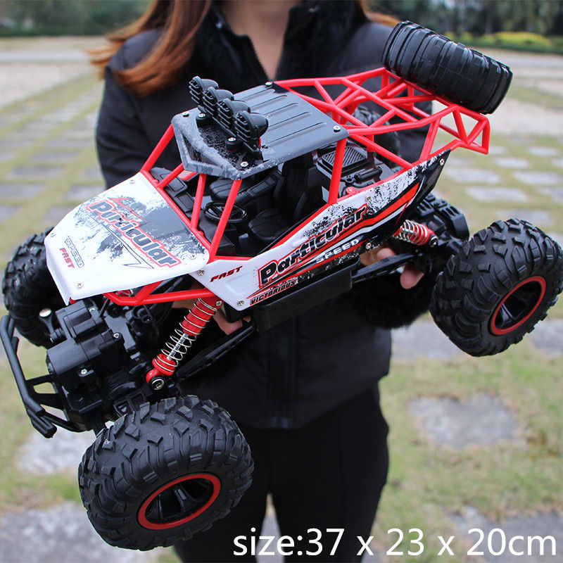 28cm RC 1/16 4WD 4x4 Driving Double Motors Drive Bigfoot Remote Control Car Model Off-Road Vehicle Toy Y200413
28cm RC 1/16 4WD 4x4 Driving Double Motors Drive Bigfoot Remote Control Car Model Off-Road Vehicle Toy Y200413