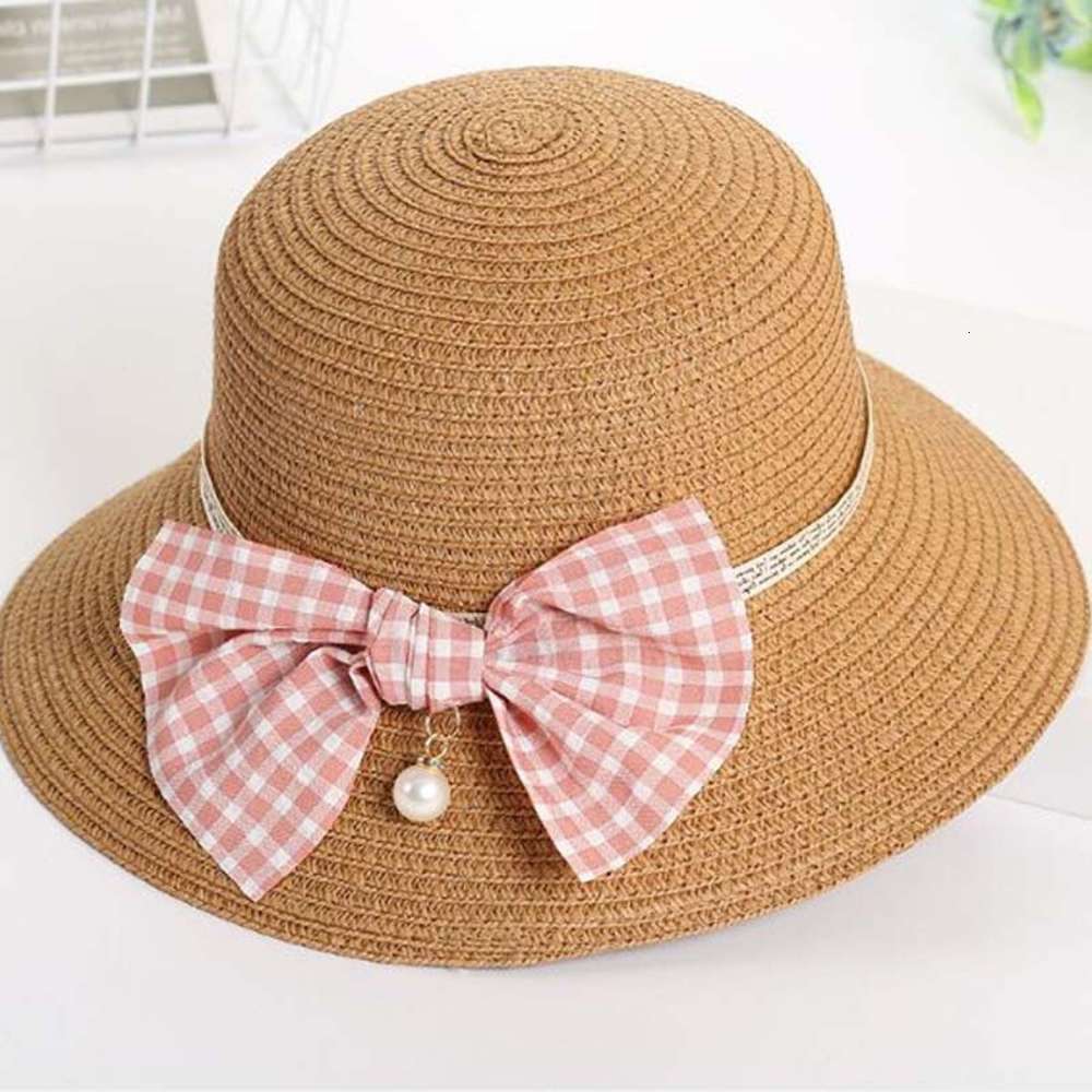 Korean parent child bow pearl Big Brim Straw children's summer travel sun Hat, Yellow
Korean parent child bow pearl Big Brim Straw children's summer travel sun Hat, Yellow