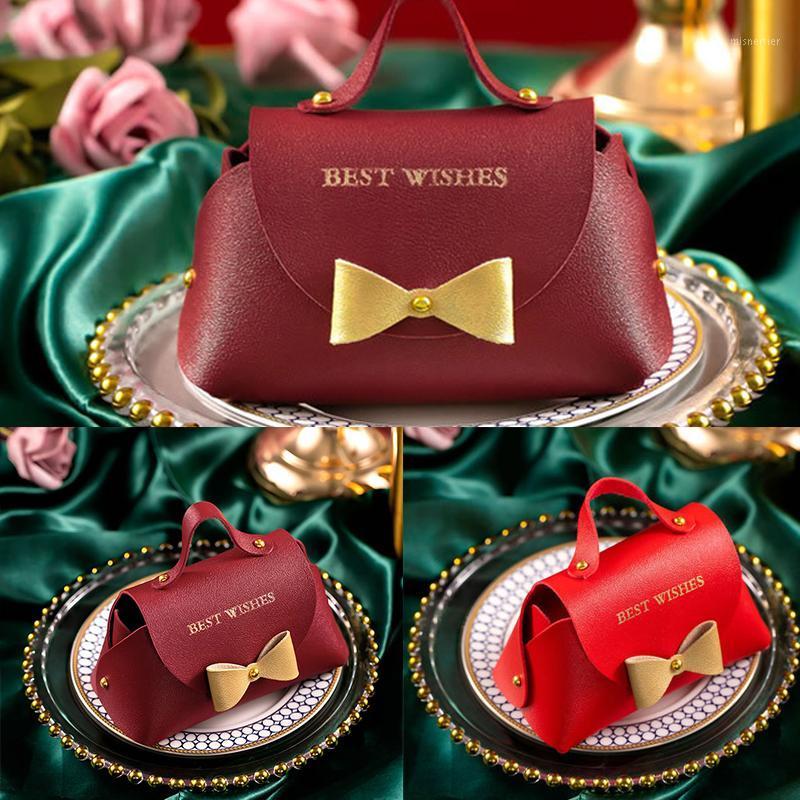 Gift Wrap 2021 Creative Colorful Leather Portable Bag Bowknot Candy Box Coin Purse Jewelry Packaging Wedding Pouch
Gift Wrap 2021 Creative Colorful Leather Portable Bag Bowknot Candy Box Coin Purse Jewelry Packaging Wedding Pouch