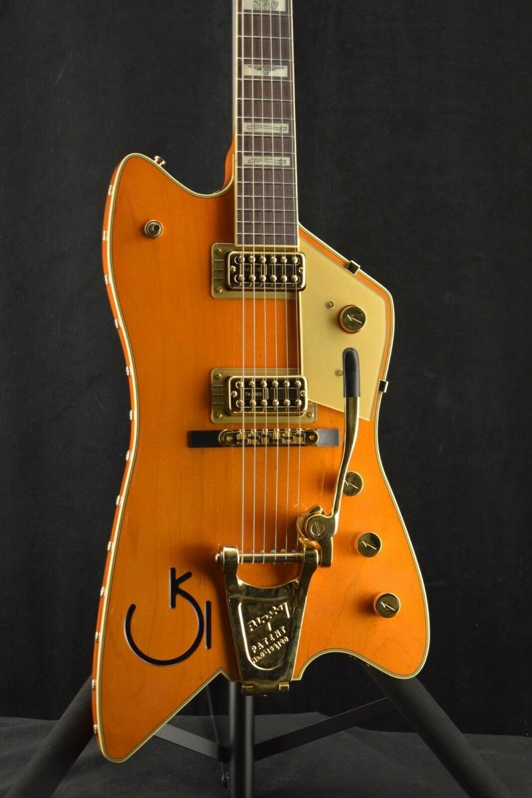6199TW Billy Bo Jupiter Fire Thunderbird Western Orange Electric Guitar Steer Head & Fence Pearloid Inlays, Bigs Tremolo Bridge, Gold Sparkle Pickguard
6199TW Billy Bo Jupiter Fire Thunderbird Western Orange Electric Guitar Steer Head & Fence Pearloid Inlays, Bigs Tremolo Bridge, Gold Sparkle Pickguard