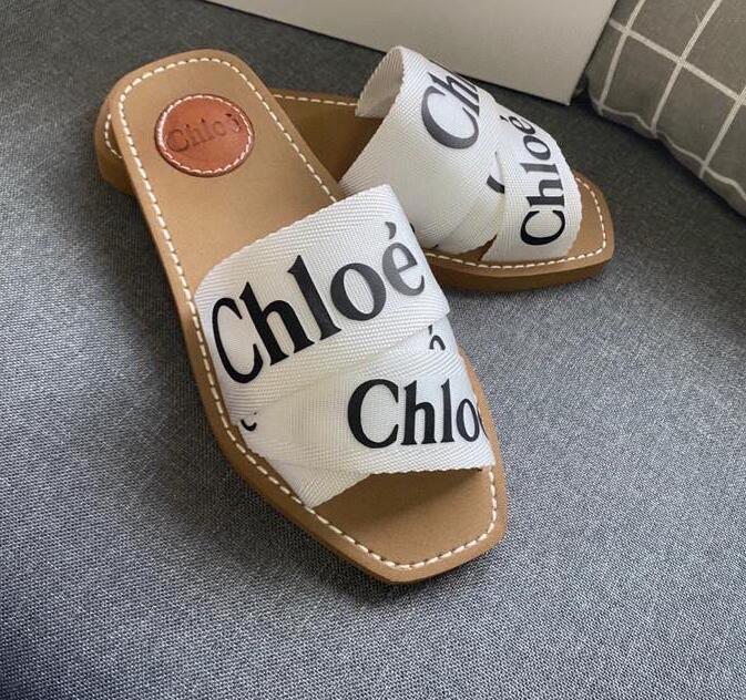 678 Top Women Woody Mules Slippers Designer Canvas Cross Woven Sandals Summer Outdoor Peep Toe Casual Slipper Letter Stylist Shoes, Black
678 Top Women Woody Mules Slippers Designer Canvas Cross Woven Sandals Summer Outdoor Peep Toe Casual Slipper Letter Stylist Shoes, Black