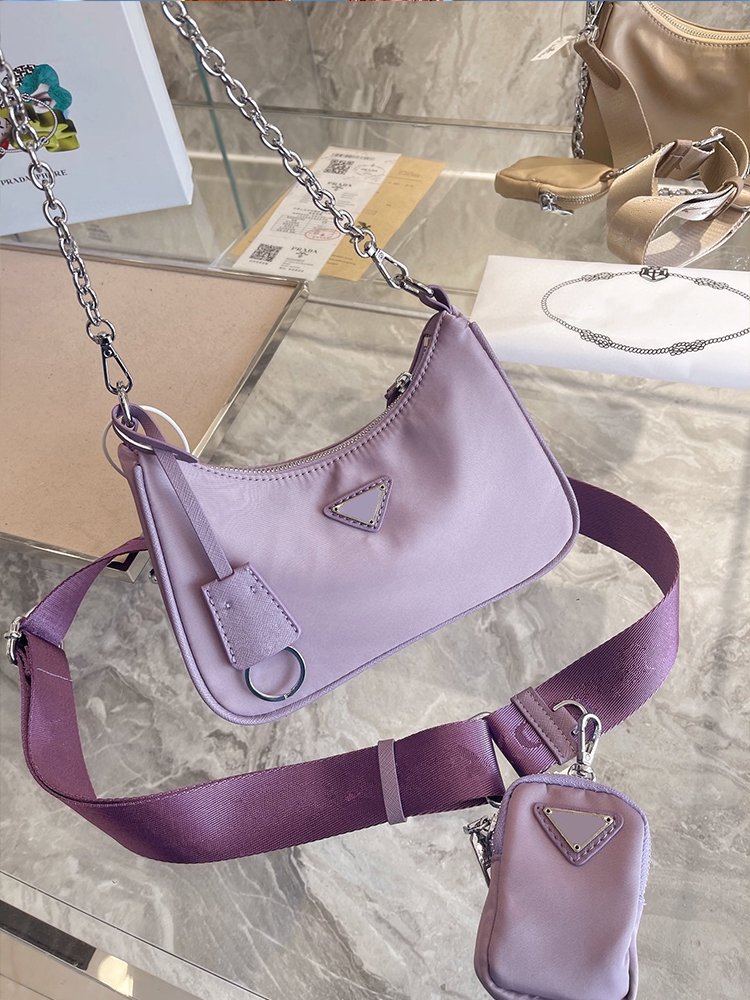 Designers Nylon Purple Women Crossbody Bag Luxurys Triangle Brand Wallet Fashion High Quality Purses Europe and America 2021 Trend Ladis Handbags, Box(not sold separately)
Designers Nylon Purple Women Crossbody Bag Luxurys Triangle Brand Wallet Fashion High Quality Purses Europe and America 2021 Trend Ladis Handbags, Box(not sold separately)